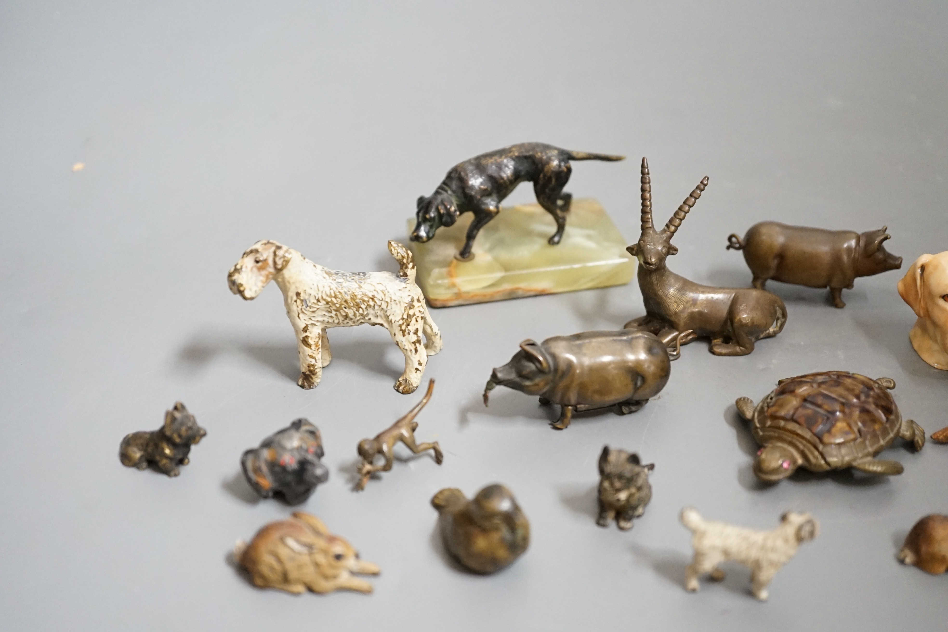 A quantity of animal related collectables including cold painted bronzes, a ‘pig’ tape measure and vesta etc.